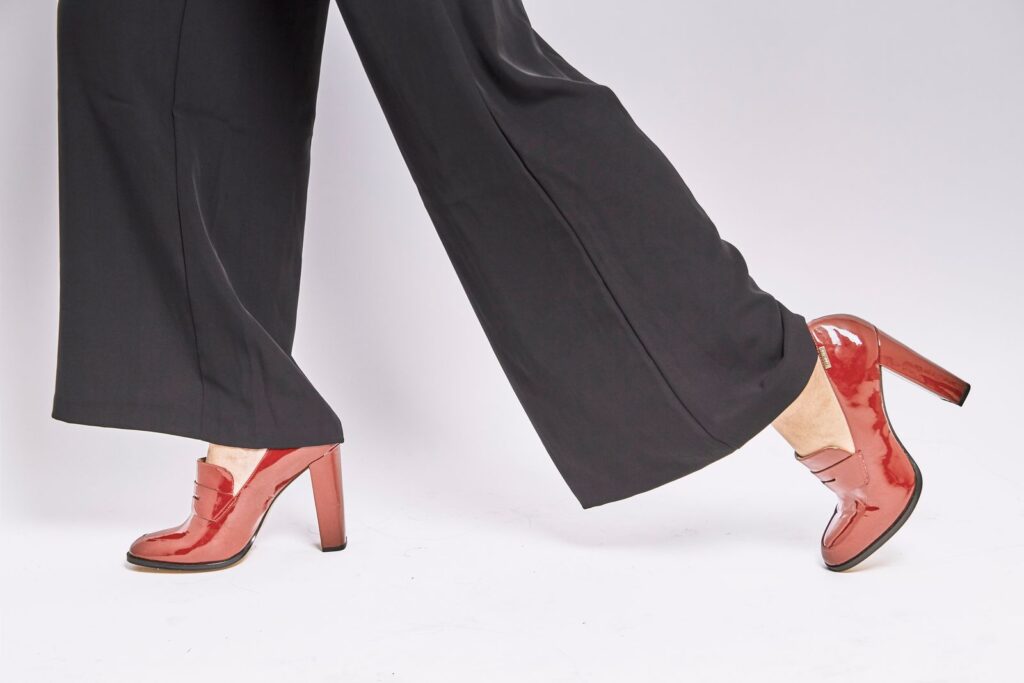 Block heel pumps worn with tailored trousers