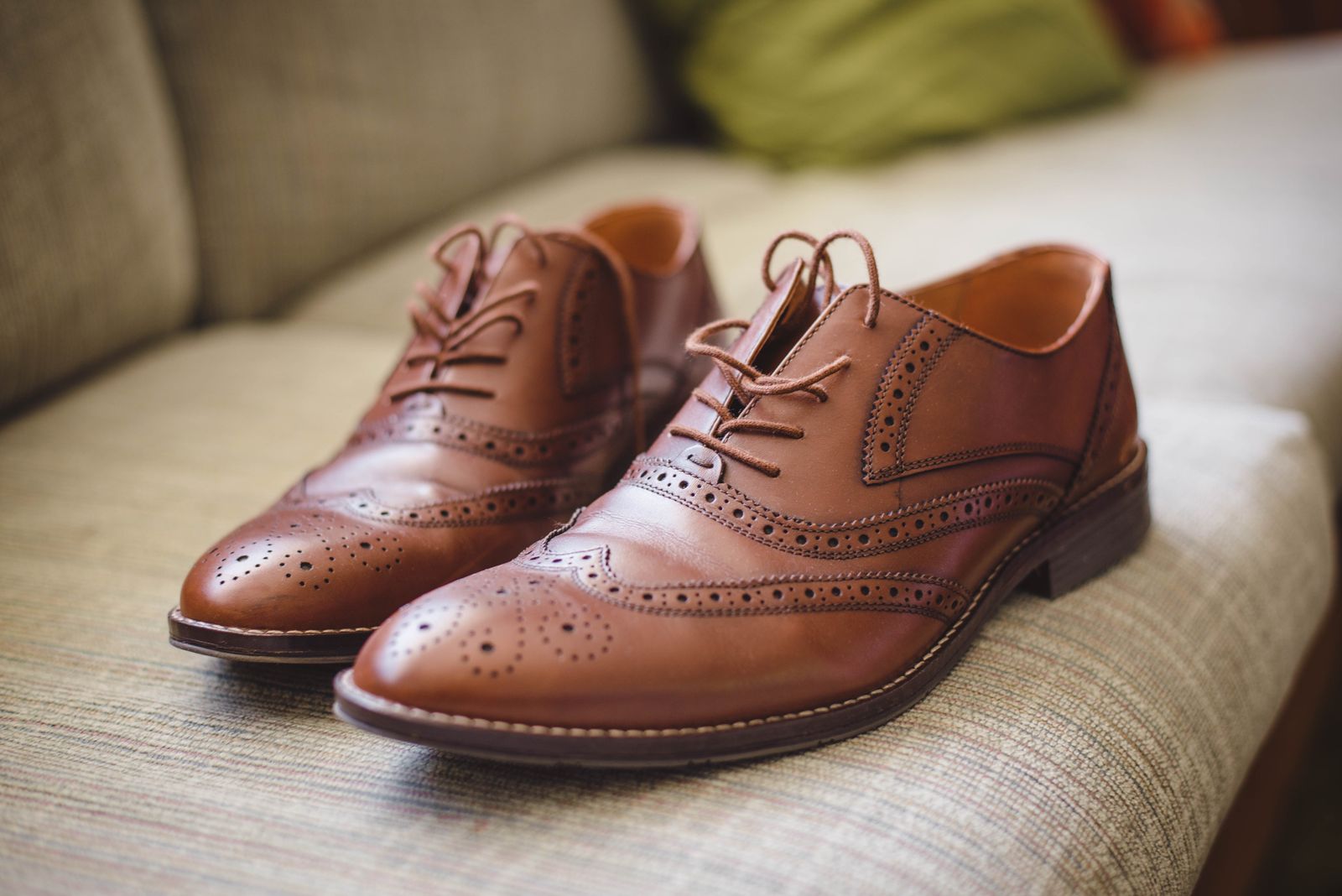 Men's tan wingtip brogue dress shoes