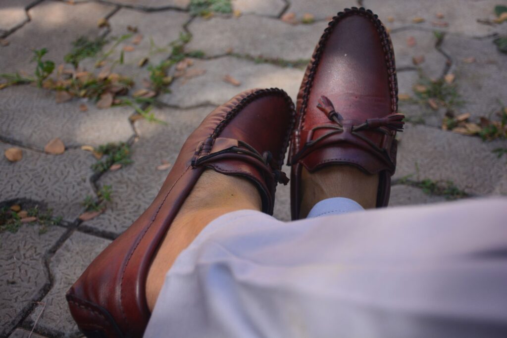 Men's tassel loafers worn with trousers
